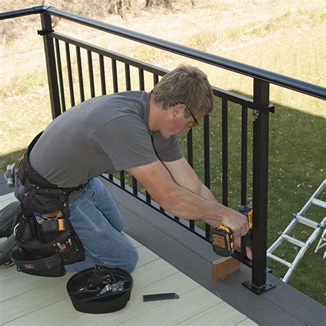 installing steel brackets for prefabricated wood and metal railing|metal deck railings installation.